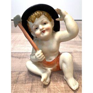 Vintage Ceramic Figurine Of Boy With Axe & Black Hat